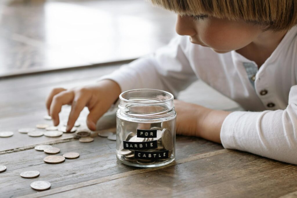 A child saving money with a definite set goal